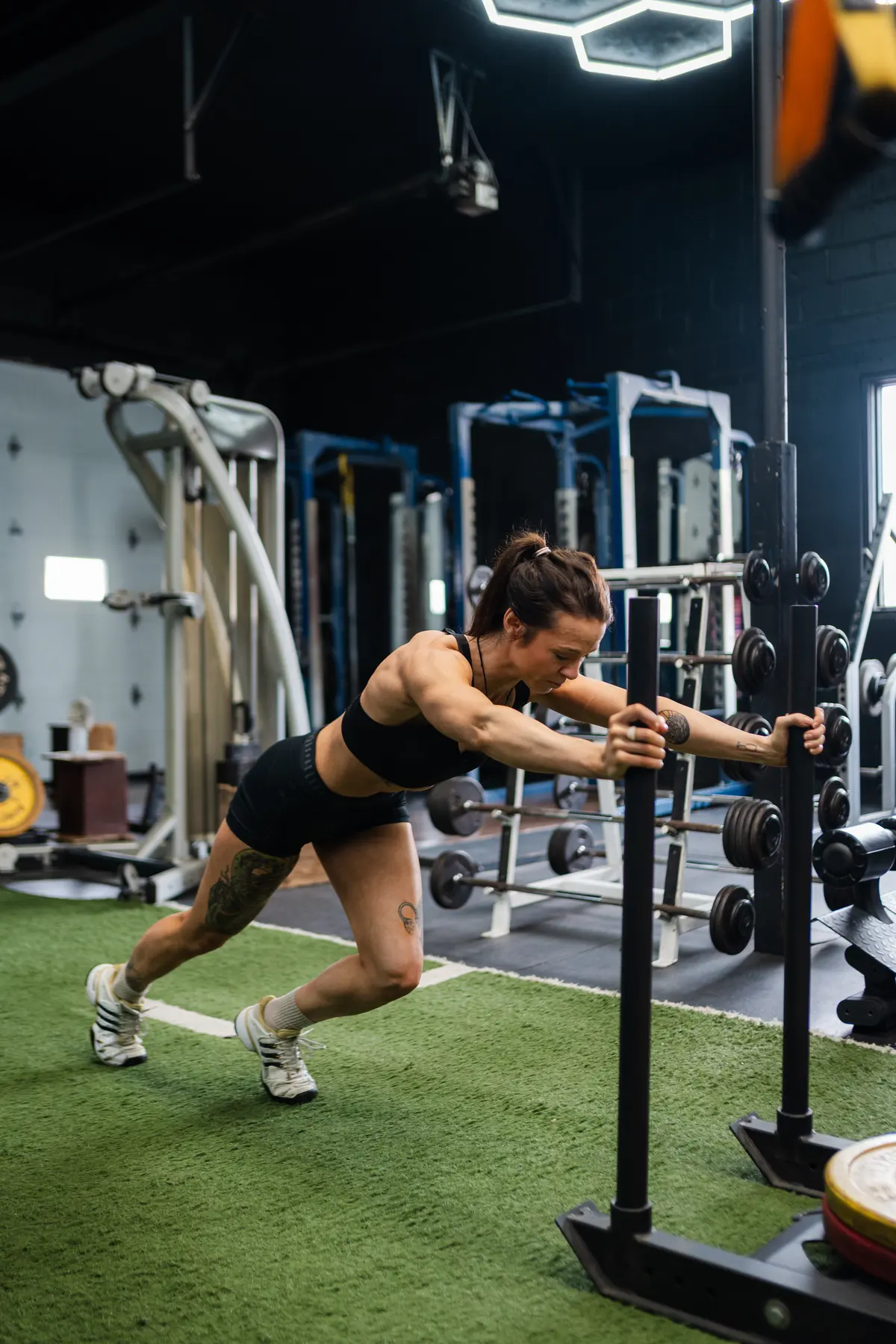 Sled push on the indoor turf